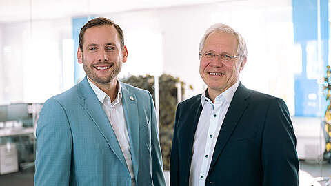 Portrait von Georg Schmidt und Carsten Huwer aus dem Vorstand der OCTO IT AG